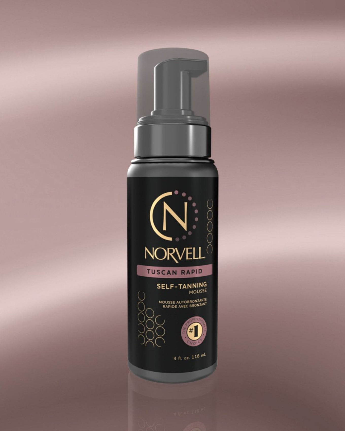 Norvell Tuscan self-tanning mousse bottle on a gradient rose gold background