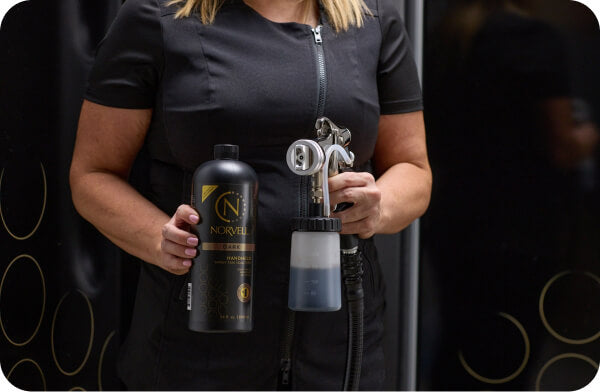 Norvell solution and spray gun used in the Nashville spray tan course