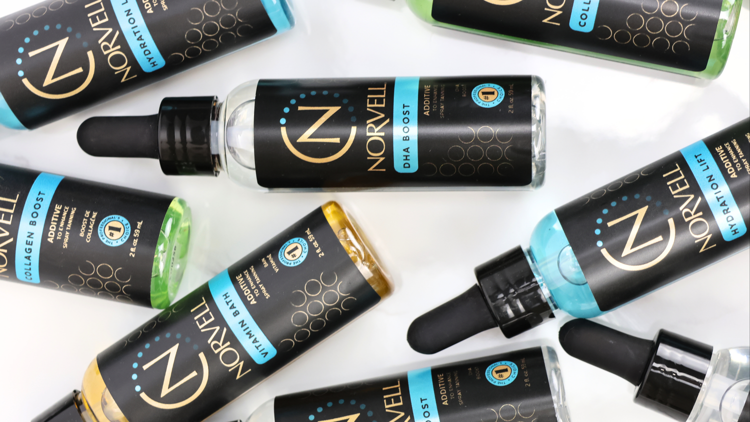 Norvell liquid dropper bottles arranged in a flat-lay pattern on a white background, featuring different additives: DHA Boost, Hydration Lift, Collagen Boost, and Vitamin Bath.