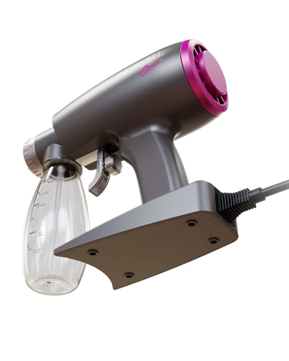 Bottom view of Norvell Oasis Gray spray gun with pink accents on a white background