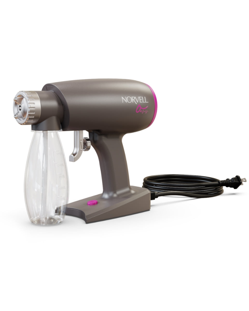 Showing long power cord of Norvell Oasis Gray spray gun with pink accents on a white background