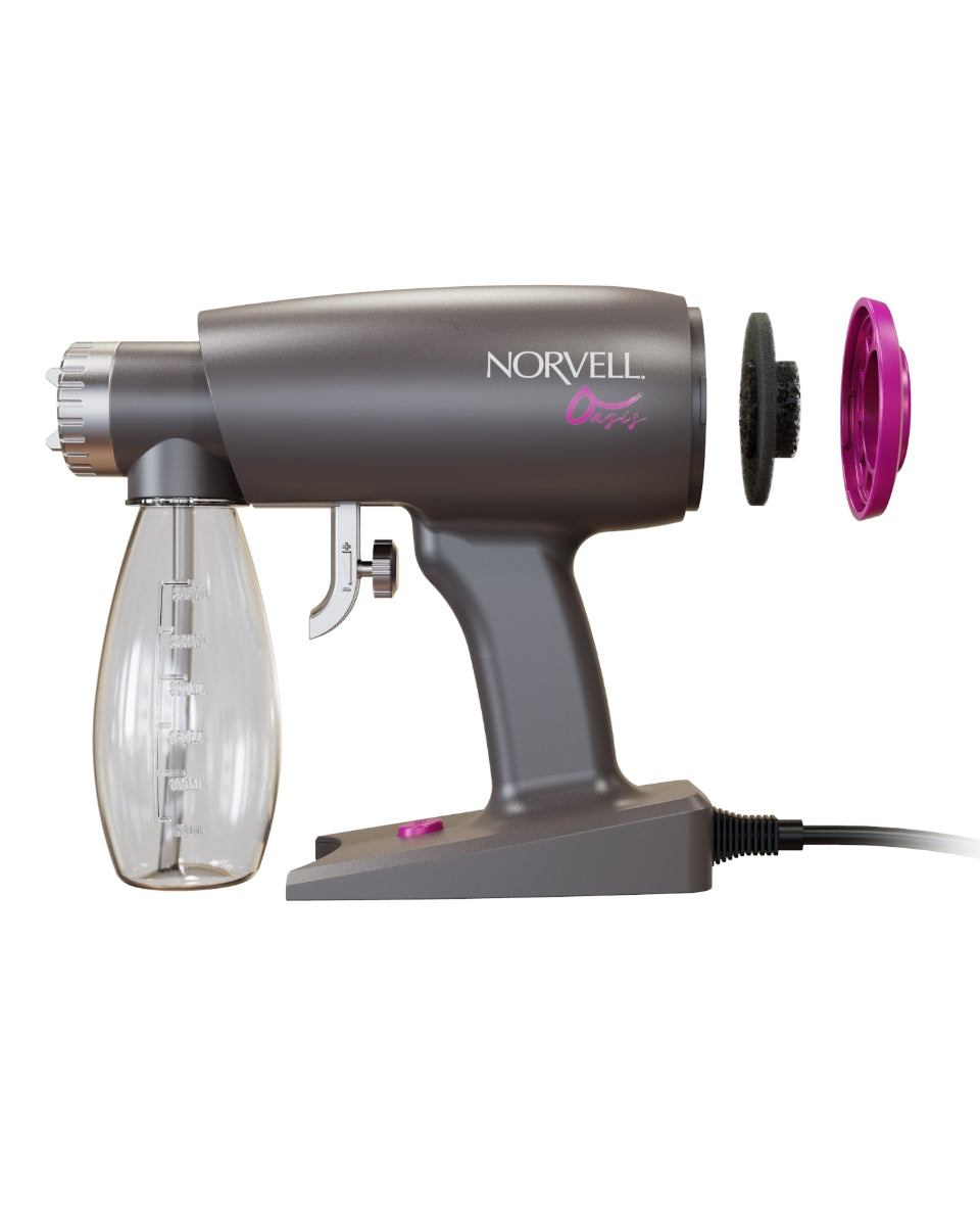 Side view of Norvell Oasis Gray spray gun with pink accents showing filter attachment on a white background