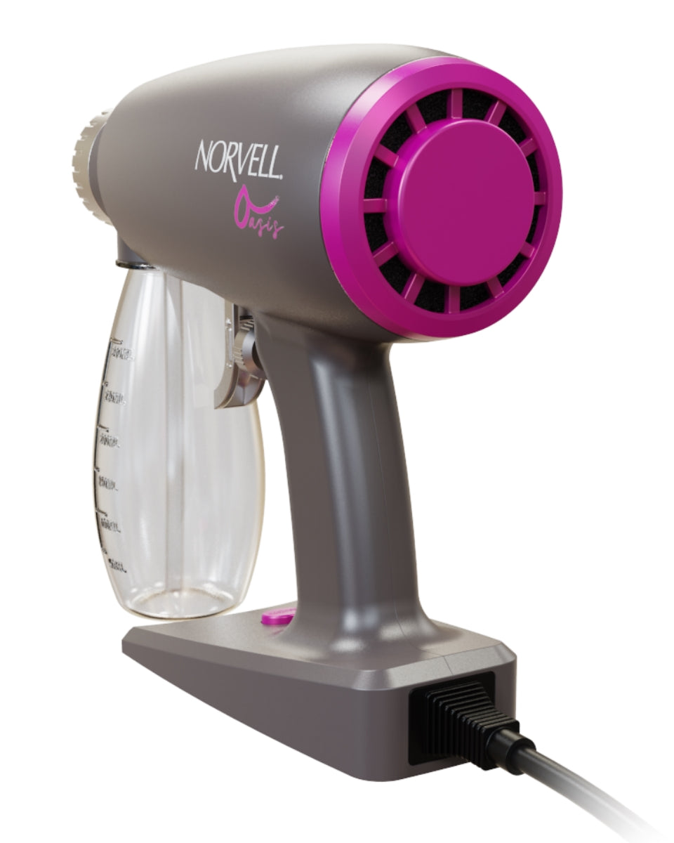 Left side view of Norvell Oasis Gray spray gun with pink accents on a white background