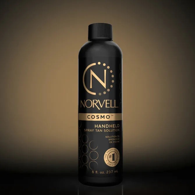 Norvell Cosmo handheld spray tan solution bottle.