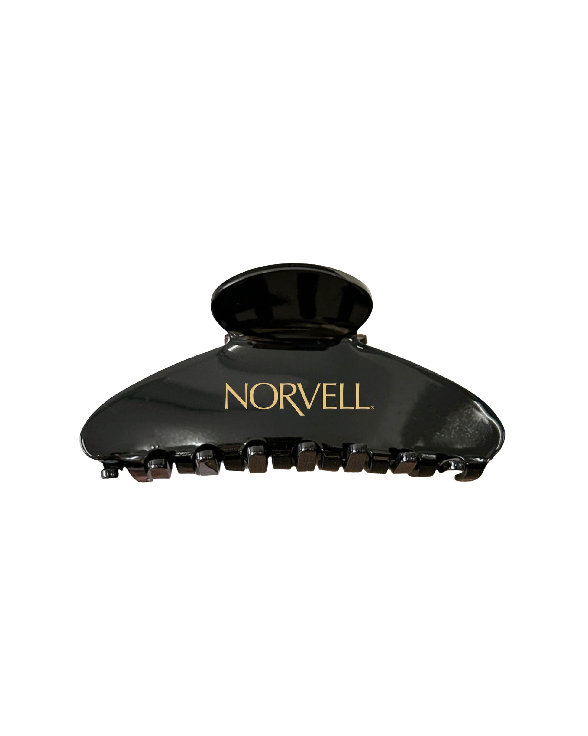 Black hair clip with 'Norvell' branding on a white background